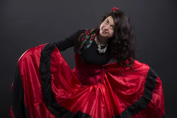 Young romany woman smiling in spanish traditional clothes — Stock Photo, Image