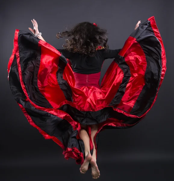 Young romany woman fly in spanish traditional clothes — Stock Photo, Image