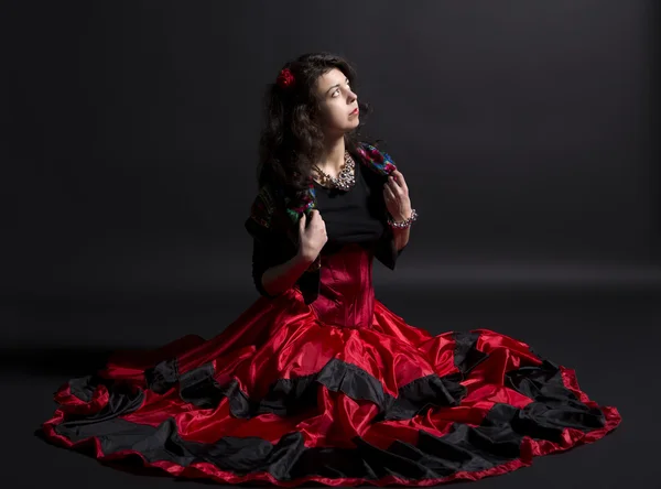 Young romany woman sit in spanish traditional clothes — Stock Photo, Image