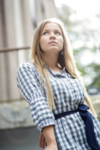 Woman in dress dreaming about future events — Stock Photo, Image