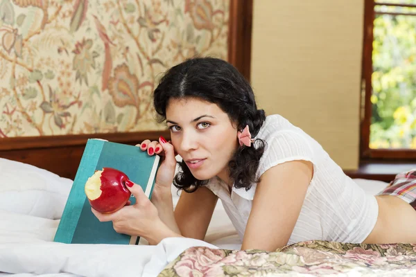 Woman in schoolgirl hold bited apple — Stock Photo, Image