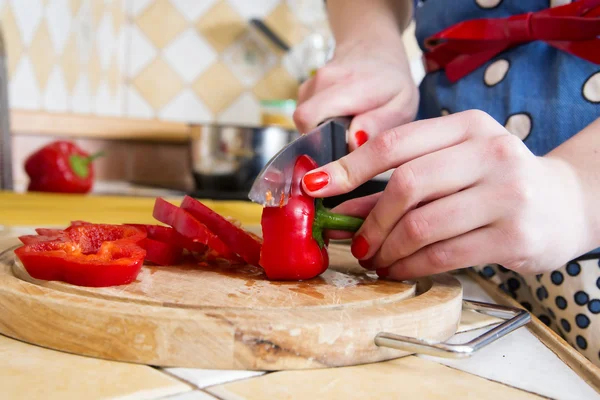 Red paprika sliced on table for pizza — Stock Photo, Image