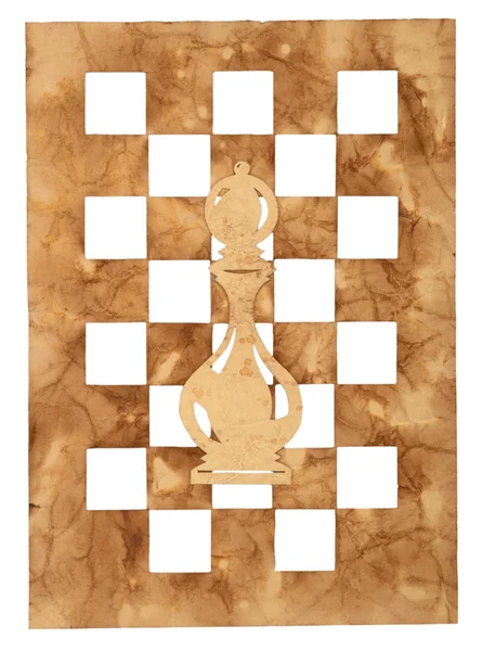 Chess piece cut from an old paper — Stock Photo, Image