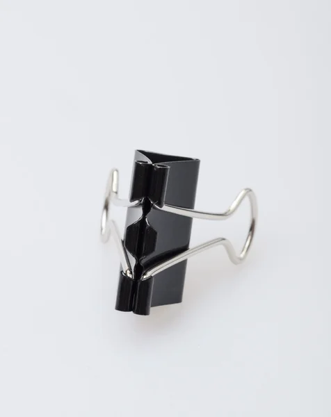 Black clerical clip for paper — Stock Photo, Image