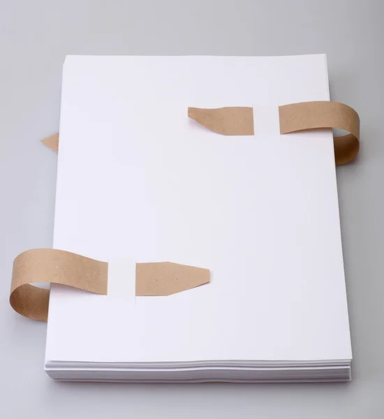 Paper with old bookmark ribbons — Stock Photo, Image