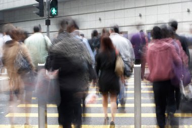 Commuters Crossing Busy Hong Kong Street clipart