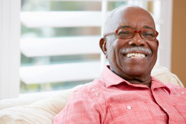 Portrait Of Happy Senior Man At Home clipart