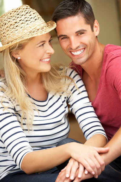 Couple Sitting Outside House — Stock Photo, Image