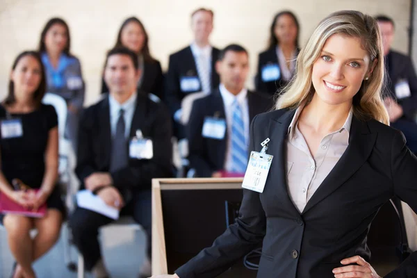 Businesswoman Delivering Presentation At Conference — Stock Photo, Image