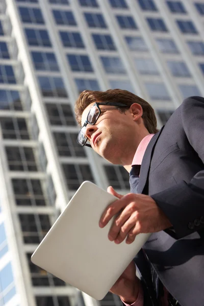 Businessman Working On Tablet Computer Outside Office — Stock Photo, Image