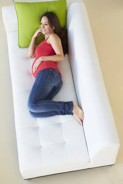 Overhead View Of Pregnant Woman Relaxing On Sofa — Stock Photo, Image