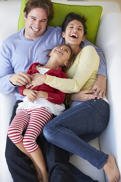 Overhead View Of Family Relaxing On Sofa — Stock Photo, Image