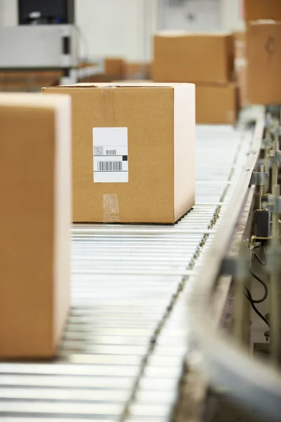 Goods On Conveyor Belt In Distribution Warehouse — Stock Photo, Image