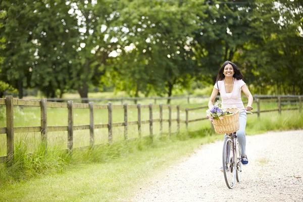 Indian Woman On Cycle Ride In Countryside — Stock Photo, Image