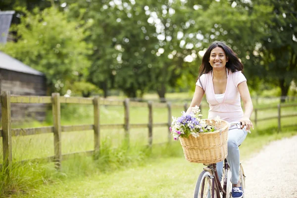 Indian Woman On Cycle Ride In Countryside — Stock Photo, Image