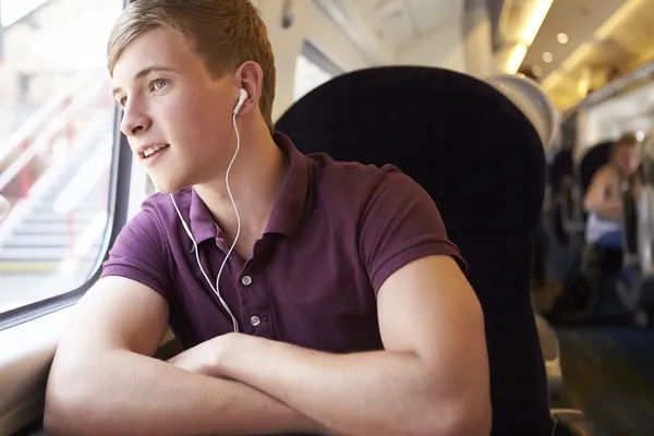 Teenager boy listening music — Stock Photo, Image