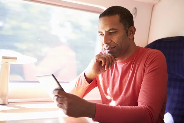 Man traveling by train — Stock Photo, Image