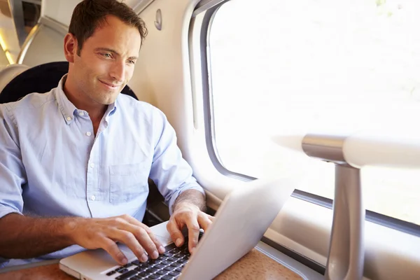 Man using laptop computer — Stock Photo, Image