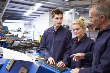 Engineer Teaching Apprentices clipart