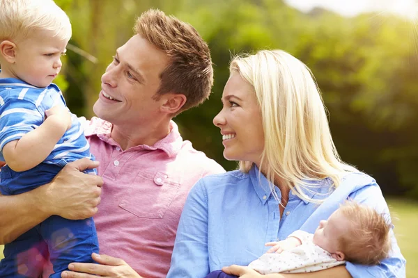 Parents Holding Young Children — Stock Photo, Image