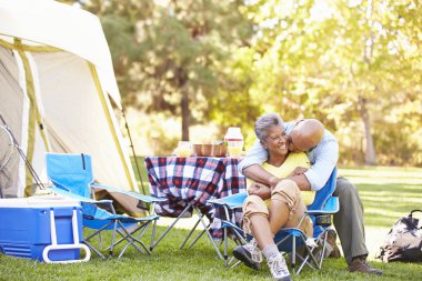 Senior Couple Enjoying Camping Holiday clipart