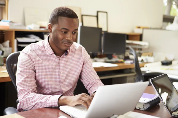 Male Architect Working At Desk On Laptop — Stock Photo, Image