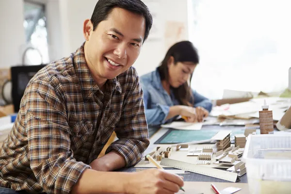 Male Architect Working On Model In Office — Stock Photo, Image