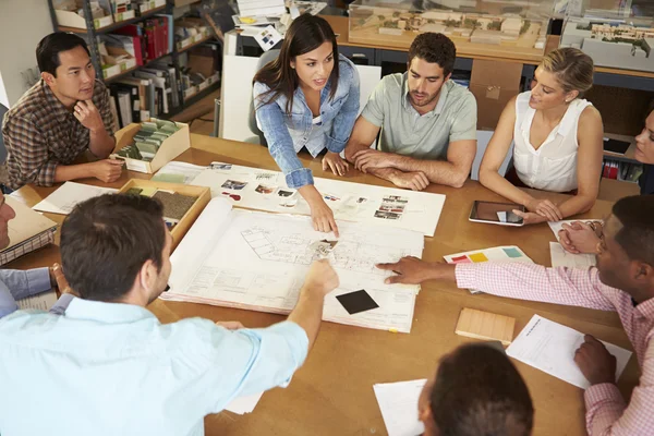 Female Boss Leading Meeting Of Architects Sitting At Table — Stock Photo, Image
