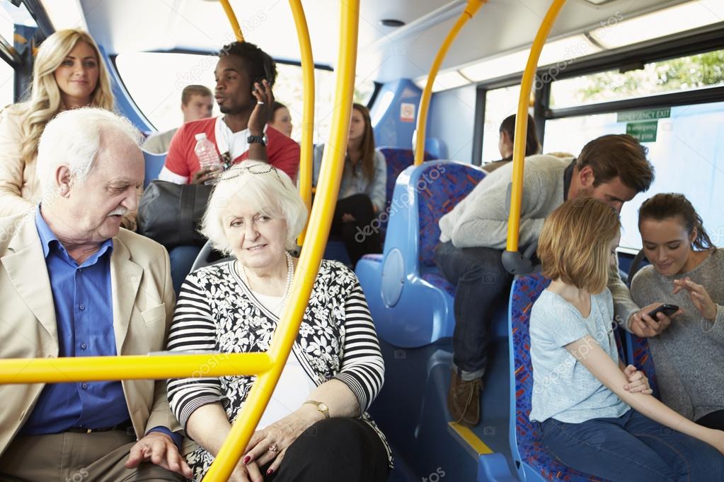 Interior Of Bus With Passengers — Stock Photo © monkeybusiness 50474757