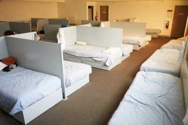 Empty Beds In Homeless Shelter clipart
