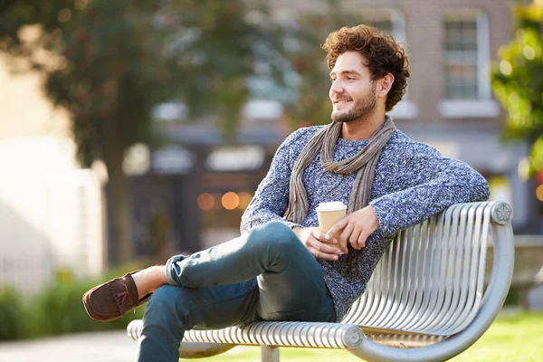 Man Relaxing On Park Bench — Stock Photo, Image