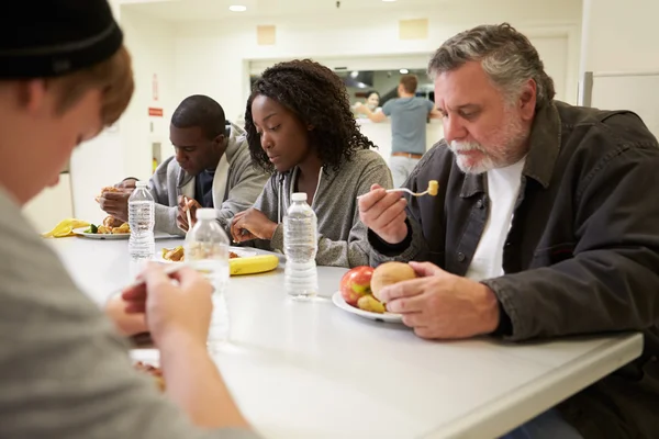 People  Eating In Homeless Shelter — Stock Photo, Image