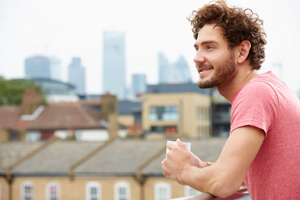 Man Relaxing On Roof Terrace — Stock Photo, Image