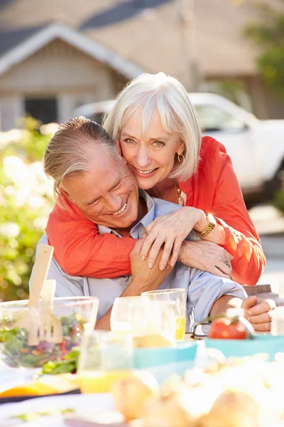 Mature Couple Eating Meal In Garden — Stock Photo, Image