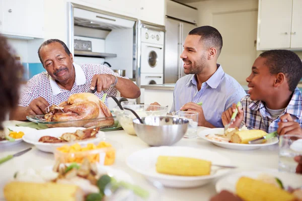 Multi-Generation Family Eating Meal Royalty Free Stock Images
