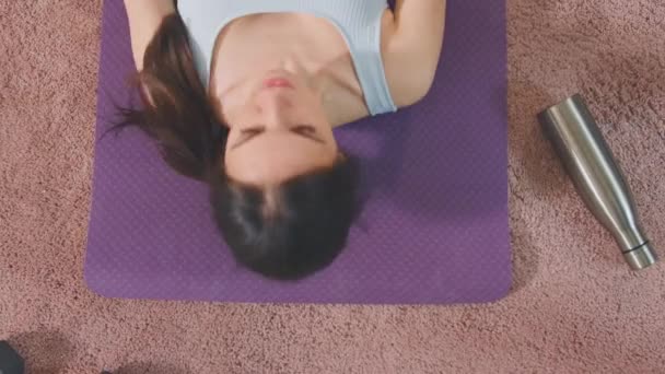 Overhead Shot Woman Resting Exercise Mat Home Workout Shot Slow — Stock Video
