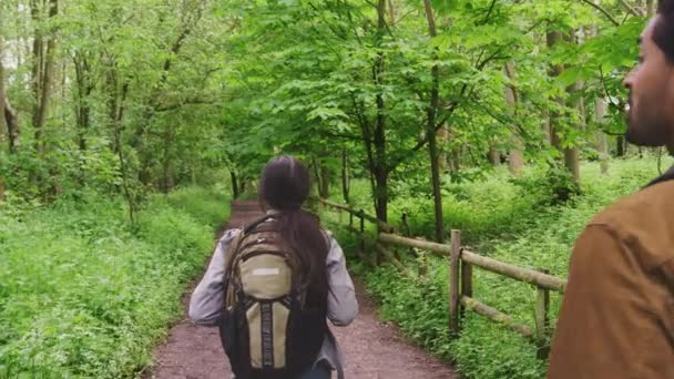 Shoulder View Young Couple Hiking Path Trees Countryside Shot Slow — Stock Video