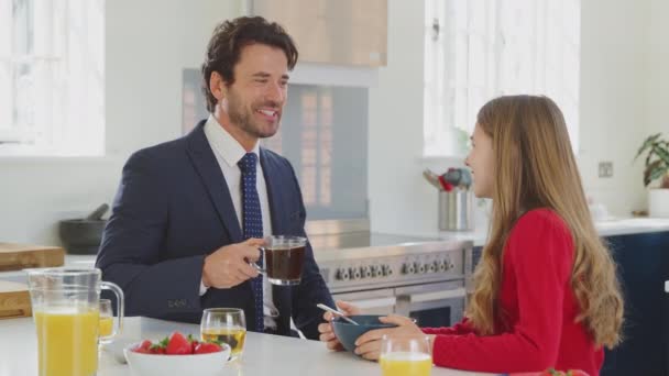 Father Wearing Suit Having Breakfast Teenage Daughter School Uniform Home — Stock Video