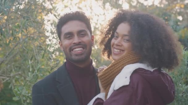 Portrait Loving Young Couple Hugging Outdoors Fall Winter Countryside Flaring — Stockvideo