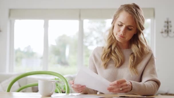 Worried Woman Sitting Table Home Reviewing Domestic Finances Opening Letter — Stock Video