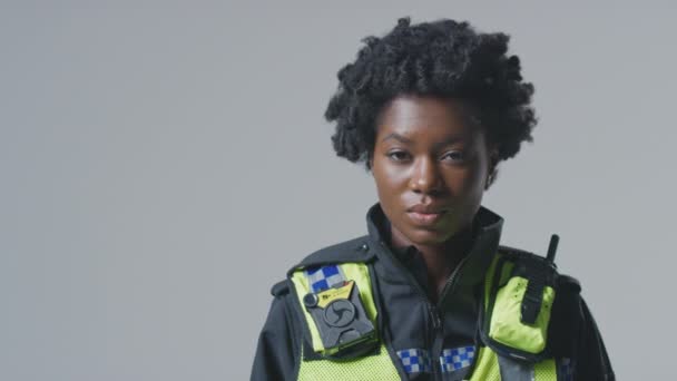 Studio Portrait Smiling Young Female Police Officer Plain Background — Stock Video © monkeybusiness #535091998 Studio Portrait Smiling Young Female Police Officer Plain Background — Stock Video © monkeybusiness #535091998