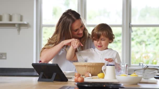 Mother Son Pyjamas Baking Kitchen Home Recipe Digital Tablet — Stok Video
