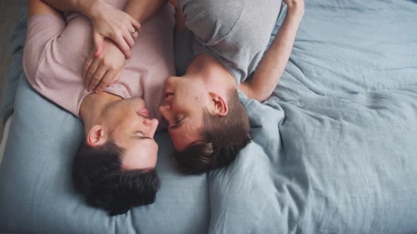 Overhead Shot Loving Same Sex Male Couple Lying Bed Home — Stock Video