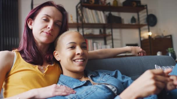 Close Loving Same Sex Female Couple Hugging Lie Sofa Home — Stock Video