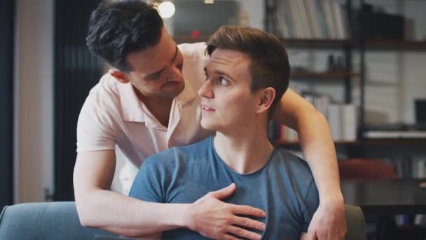 Man Sitting Sofa Home Using Laptop Being Joined Male Partner — Stock Video