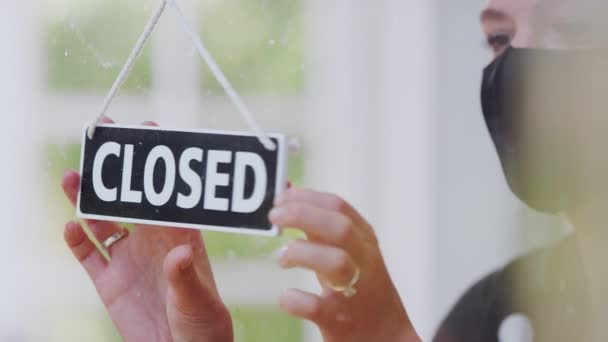 Female Owner Coffee Shop Wearing Face Mask Turning Open Sign — Wideo stockowe