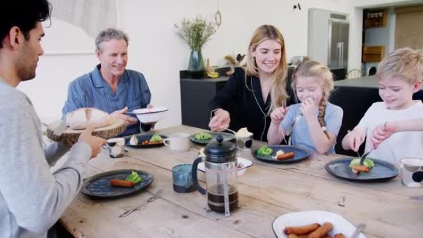 Multi Generation Family Sitting Table Home Pyjamas Enjoying Brunch Together — 图库视频影像