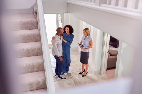 Couple Viewing Potential New Home Female Realtor — Stock Photo, Image