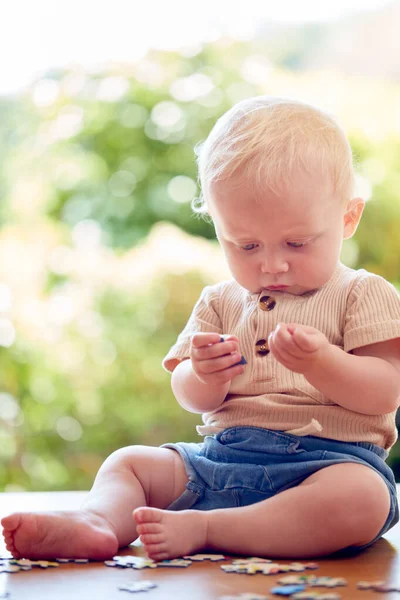 Baby Boy Having Fun Sitting Home Playing Jigsaw Puzzle Pieces — Stock Photo, Image