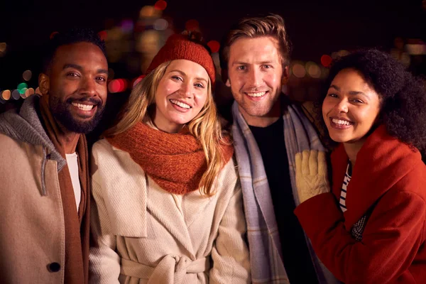 Portrait Friends Outdoors Wearing Coats Scarves Meeting City Lights Night — Stock Photo, Image